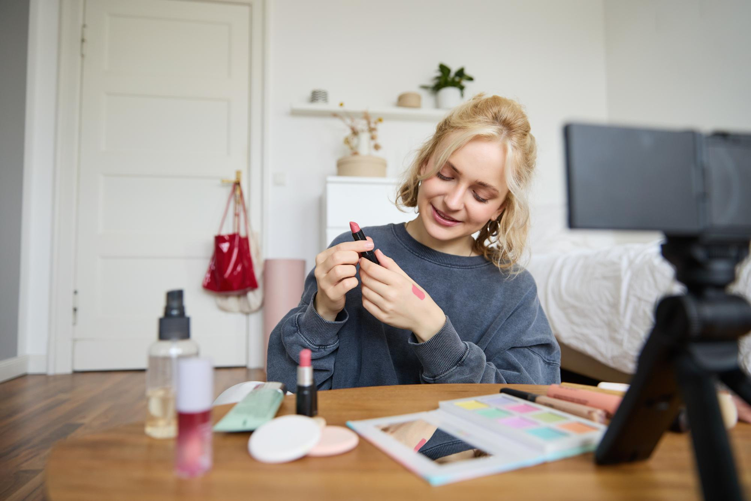 How to attract more clients for a specialist Beauty specialist filming a video about cosmetics for her portfolio